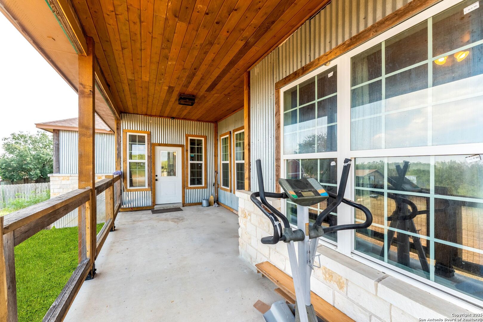 2211 Geneva Street Castroville, TX 78009 - Photo 35 of 41 a view of a porch with chairs and backyard