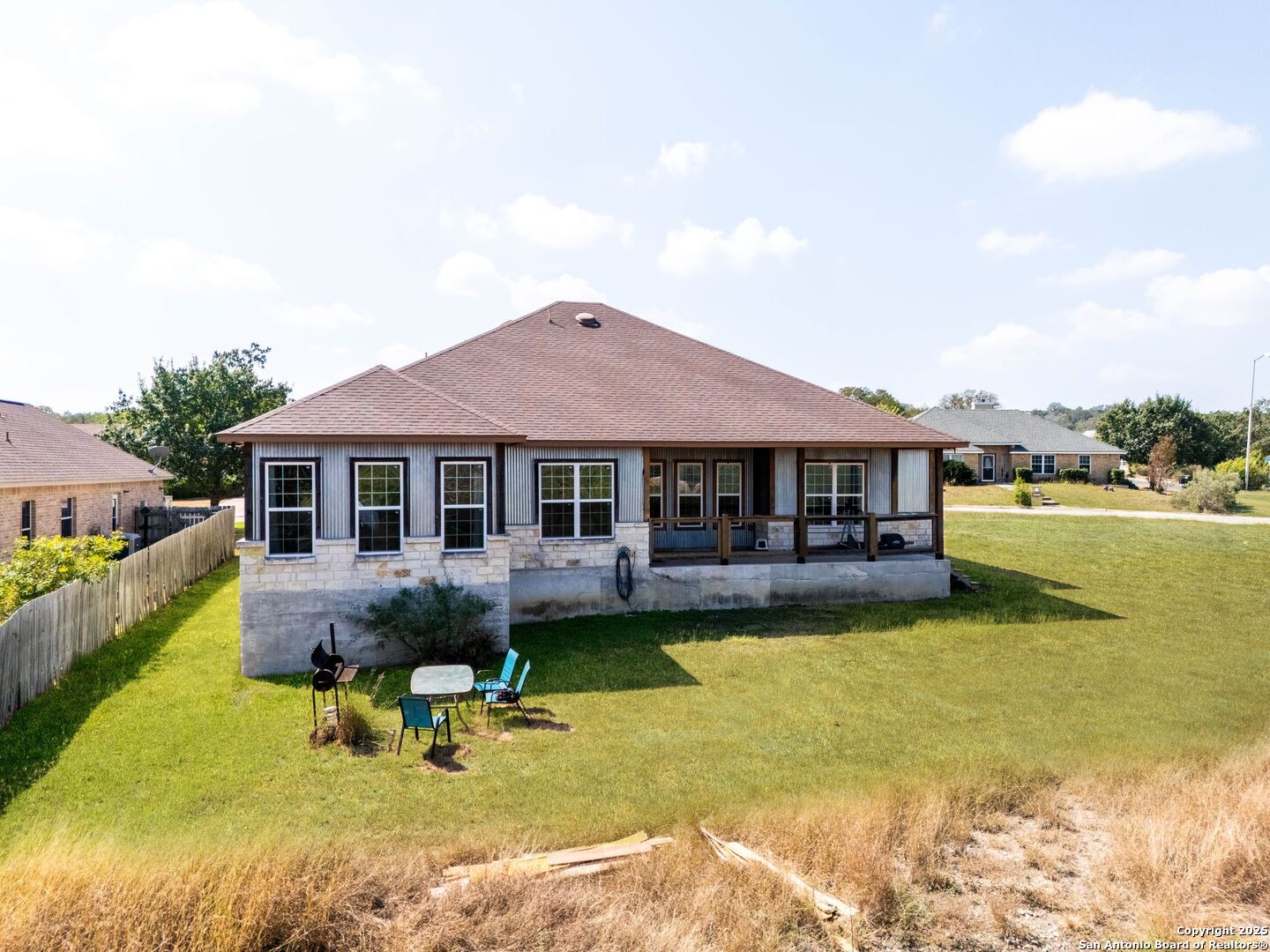 2211 Geneva Street Castroville, TX 78009 - Photo 36 of 41 a swimming pool view with a seating space and a garden view