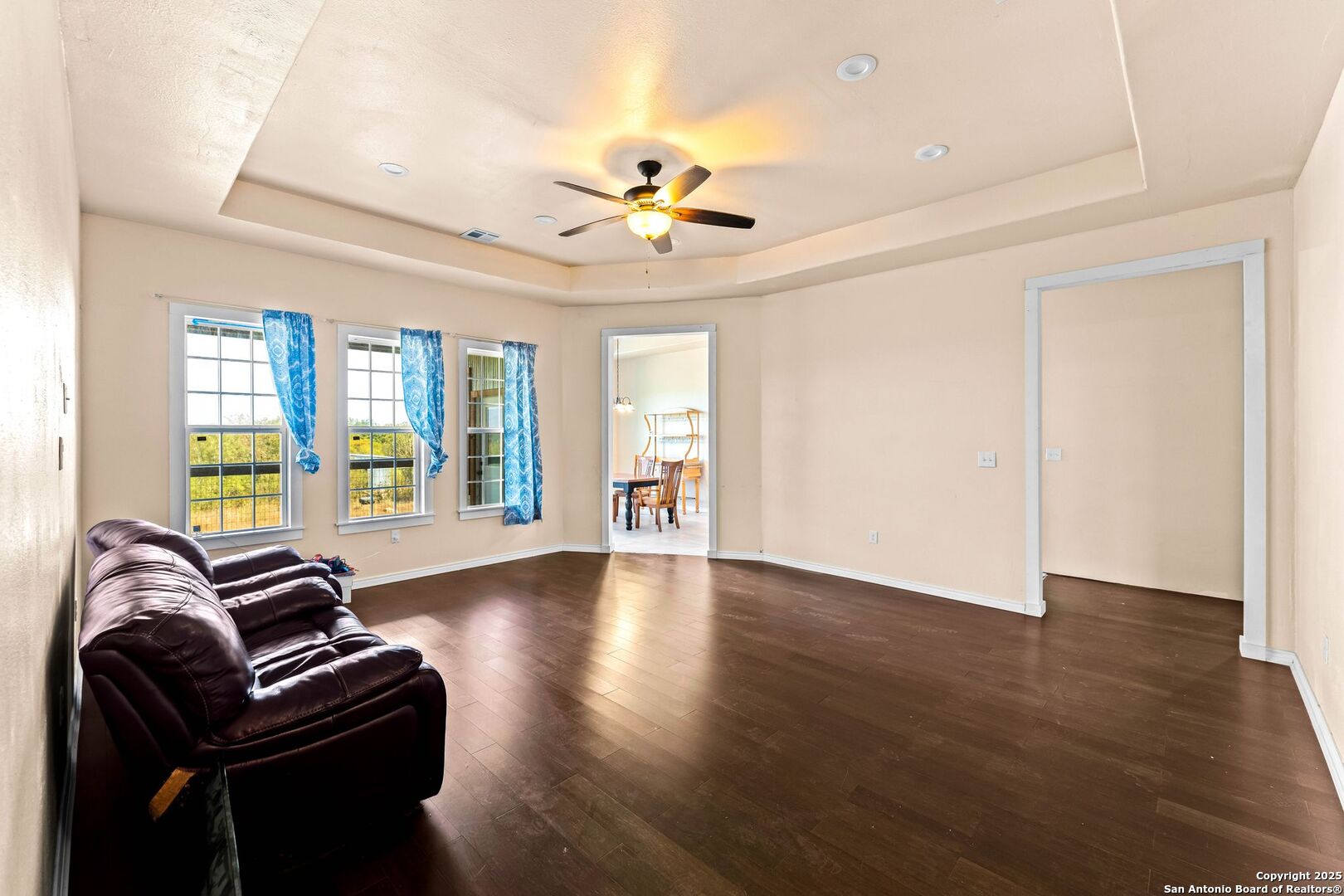 2211 Geneva Street Castroville, TX 78009 - Photo 8 of 41 a living room with furniture and wooden floor