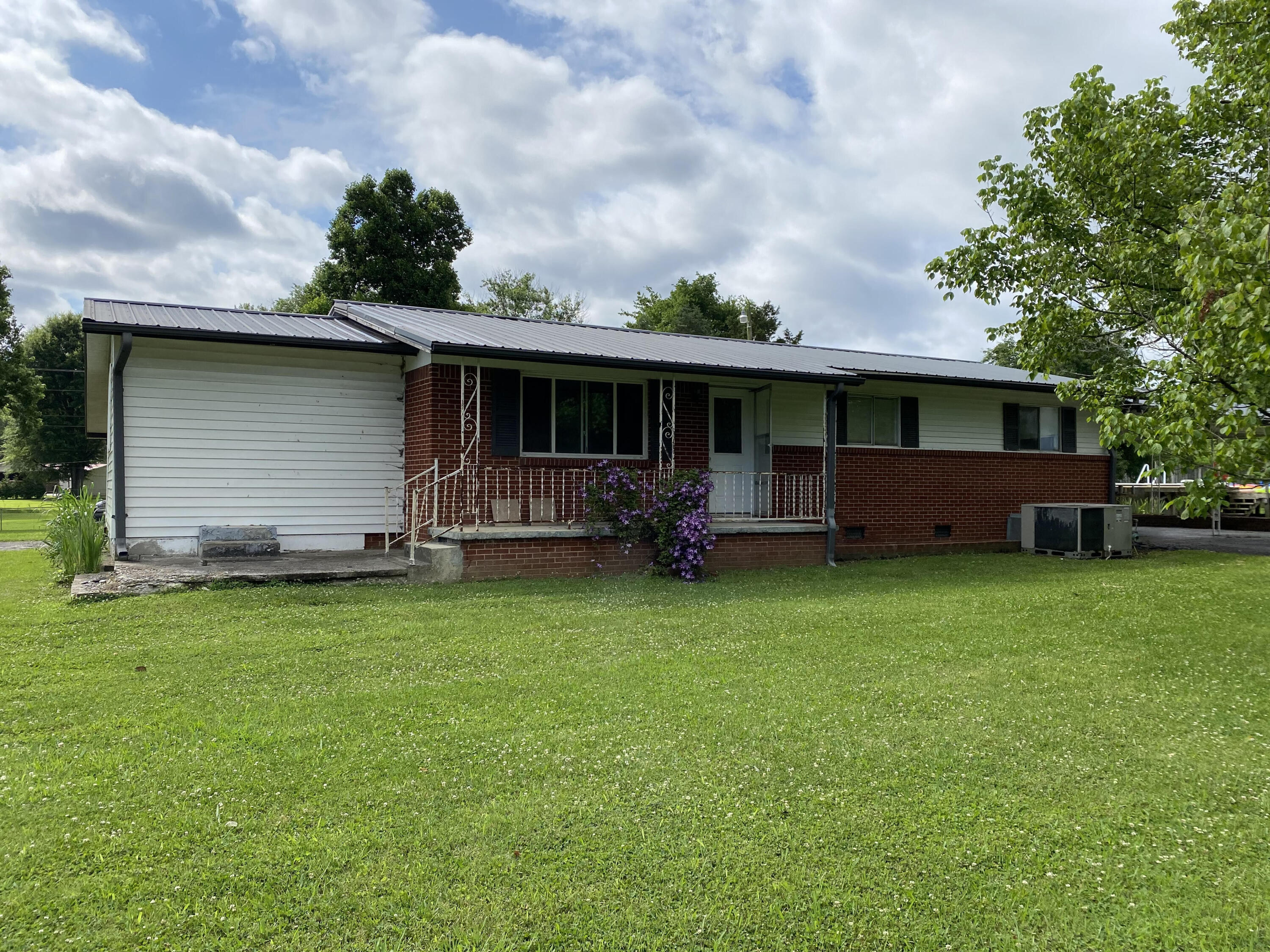 1110 Hancock Road Jasper, TN 37347 - Photo 1 of 9 Front of home