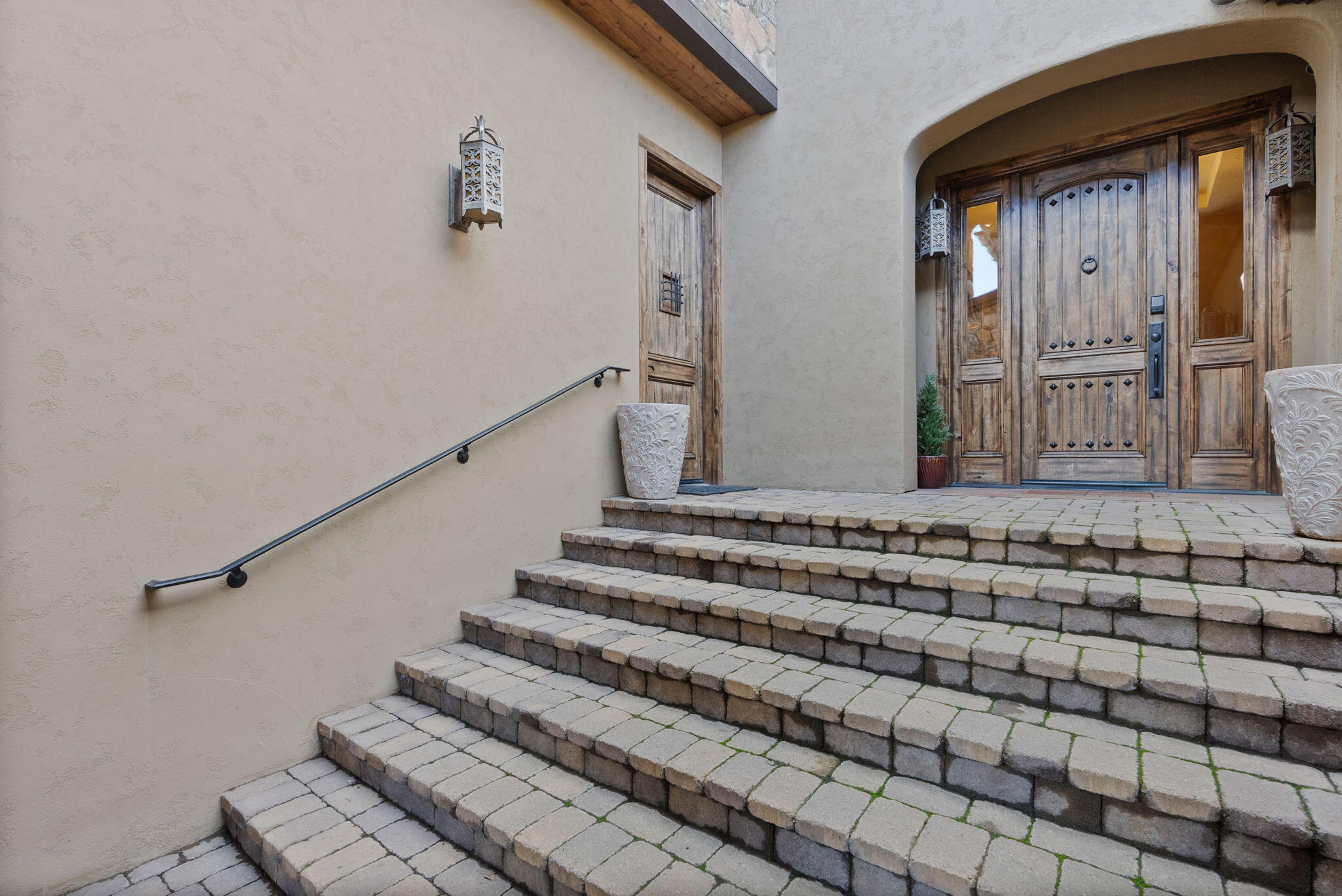 22887 Ghost Tree Lane Bend, OR 97701 - Photo 7 of 97 The timeless natural stone exterior features a welcoming courtyard