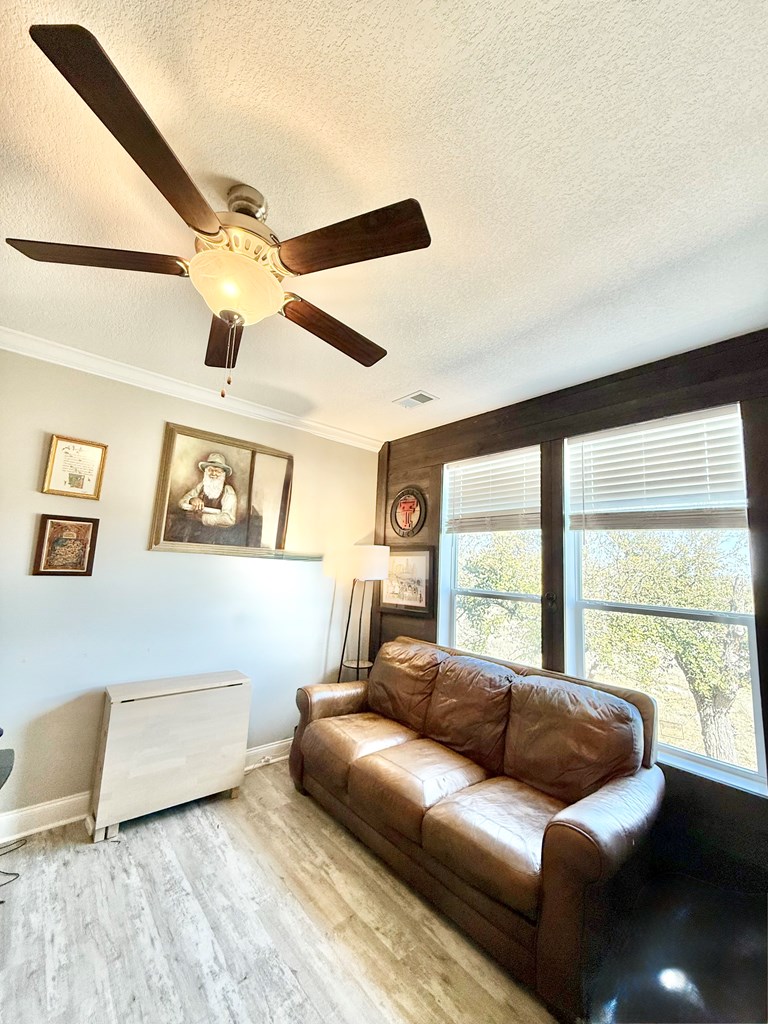 589 Scott Branch Road Harper, TX 78631 - Photo 17 of 21 a living room with furniture and a large window