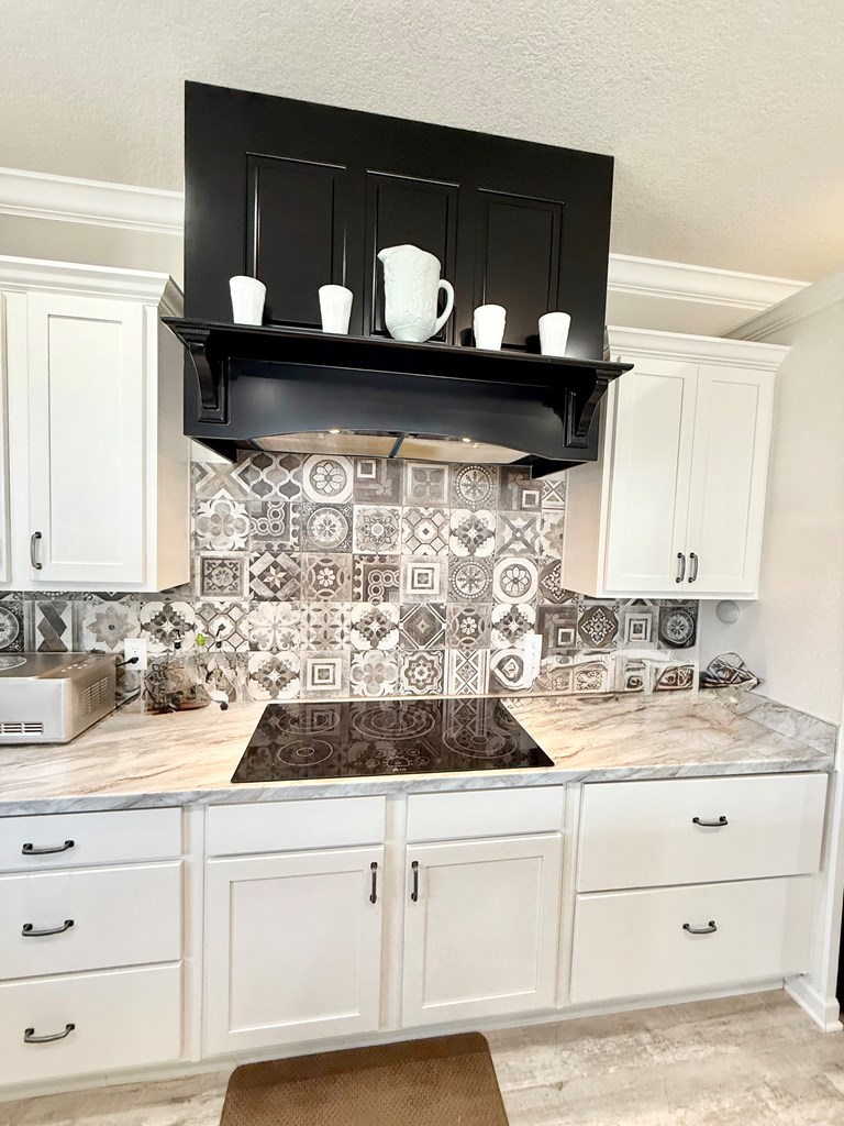 589 Scott Branch Road Harper, TX 78631 - Photo 6 of 21 a kitchen with a sink and cabinets