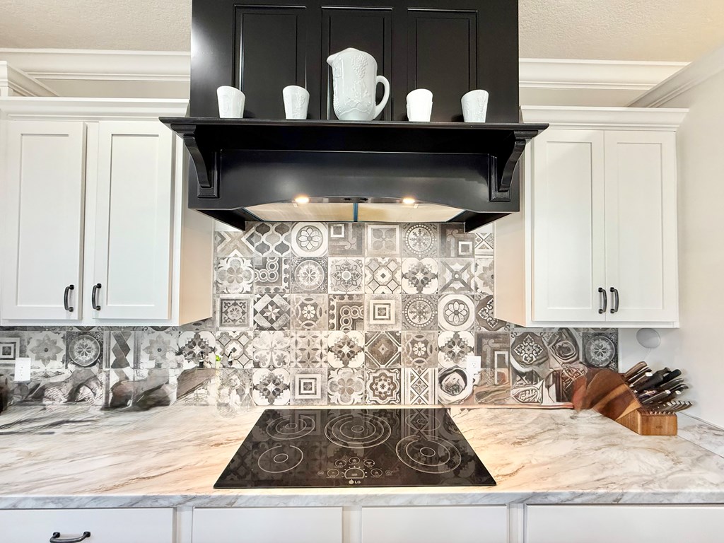 589 Scott Branch Road Harper, TX 78631 - Photo 7 of 21 a kitchen with a stove and cabinets
