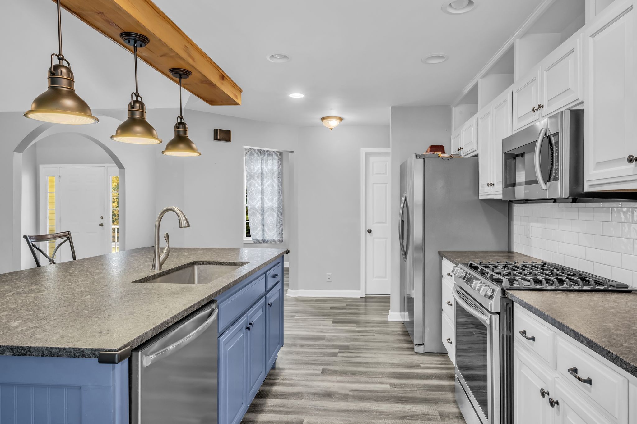 1345 Nails Creek Road Dickson, TN 37055 - Photo 12 of 27 a kitchen with stainless steel appliances granite countertop a sink a stove and a refrigerator