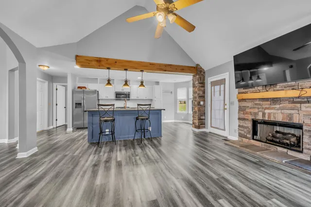 a dining room with furniture and fireplace