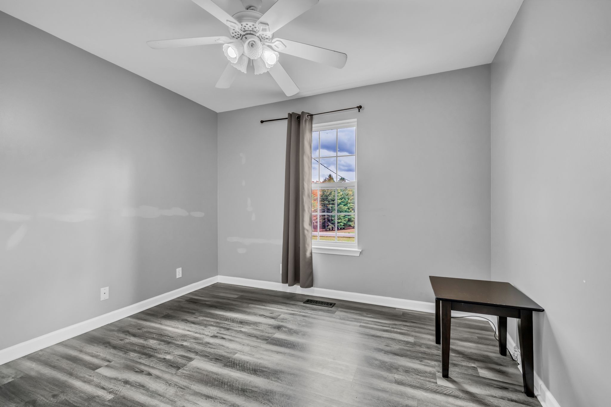 1345 Nails Creek Road Dickson, TN 37055 - Photo 21 of 27 wooden floor in an empty room with a window