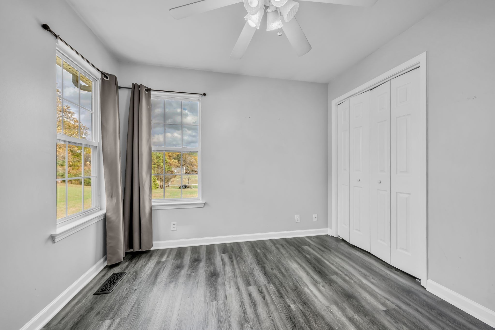 1345 Nails Creek Road Dickson, TN 37055 - Photo 22 of 27 wooden floor in an empty room with a window