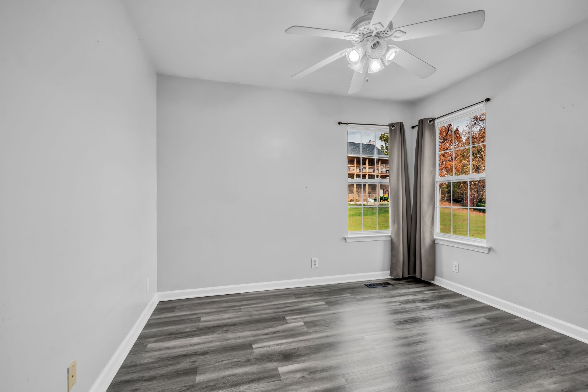 1345 Nails Creek Road Dickson, TN 37055 - Photo 24 of 27 wooden floor in an empty room with a window