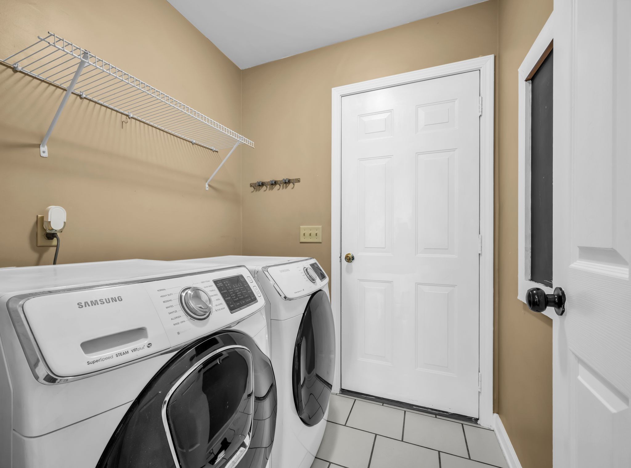 1345 Nails Creek Road Dickson, TN 37055 - Photo 27 of 27 a view of storage and utility room with washer and dryer