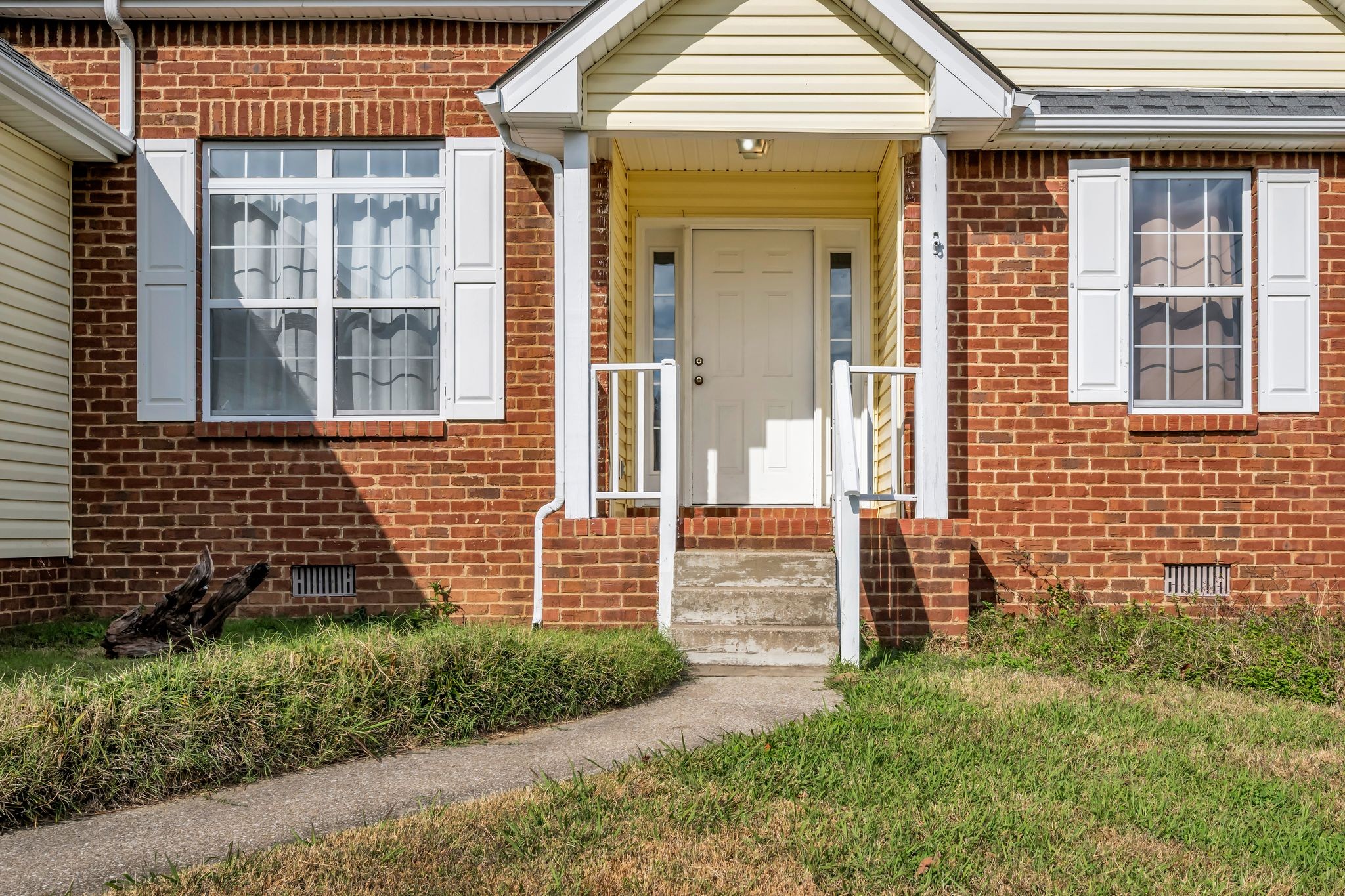 1345 Nails Creek Road Dickson, TN 37055 - Photo 3 of 27 a front view of a house with a garden