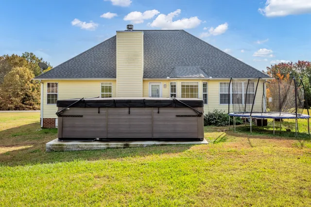 a view of a house with a swimming pool