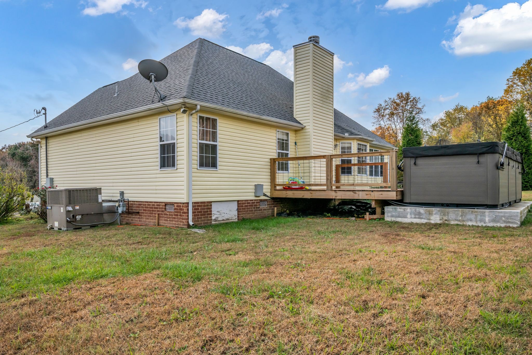 1345 Nails Creek Road Dickson, TN 37055 - Photo 6 of 27 a view of a house with a backyard