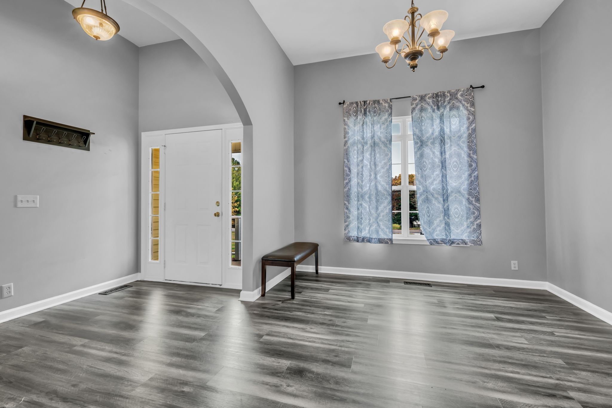 1345 Nails Creek Road Dickson, TN 37055 - Photo 7 of 27 a view of empty room with wooden floor and fan
