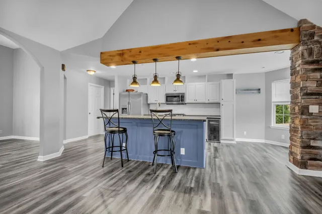 a view of kitchen with breakfast area