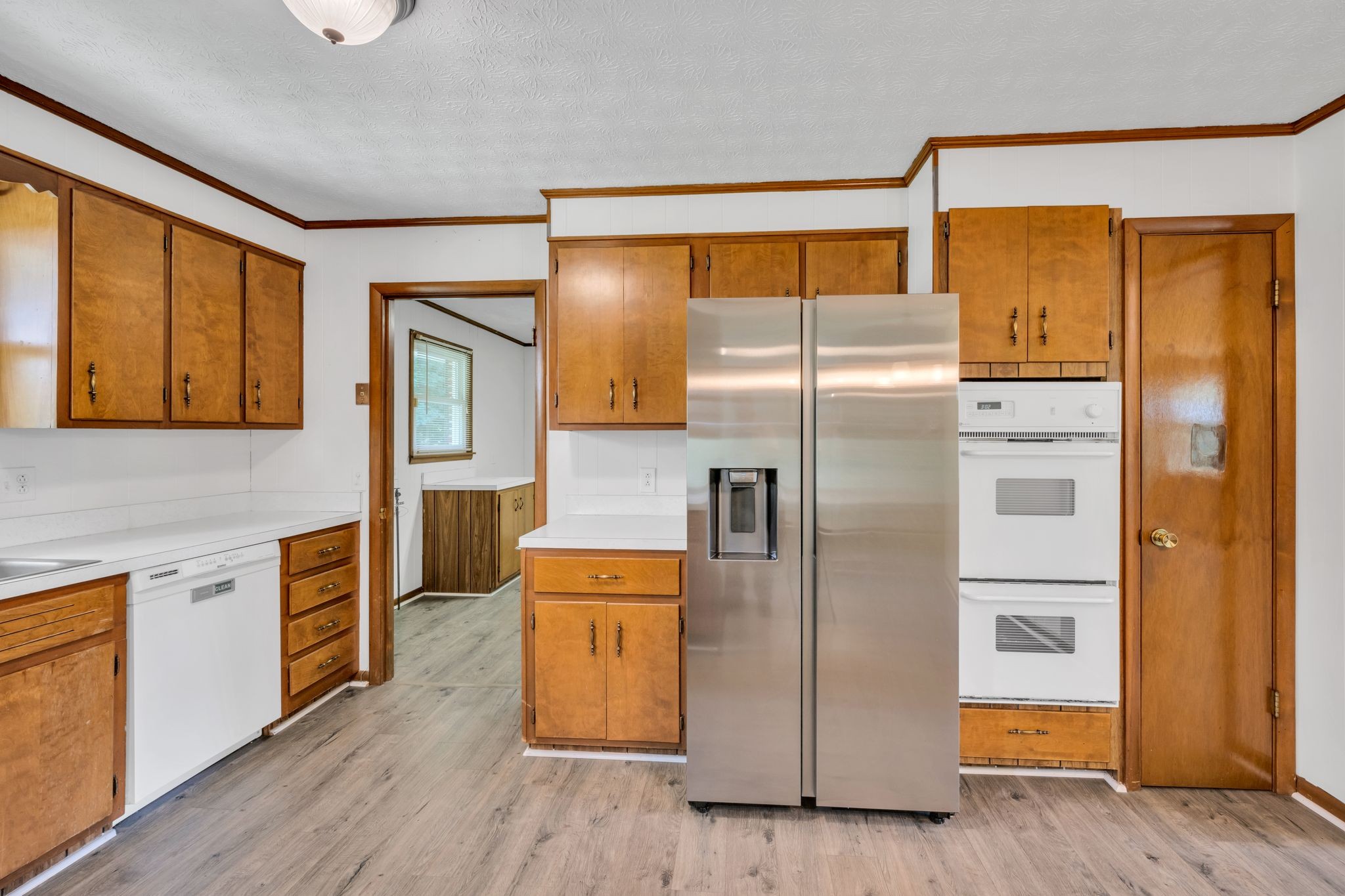 1300 2 Mile Road Burns, TN 37029 - Photo 16 of 38 a kitchen with stainless steel appliances a refrigerator and a stove