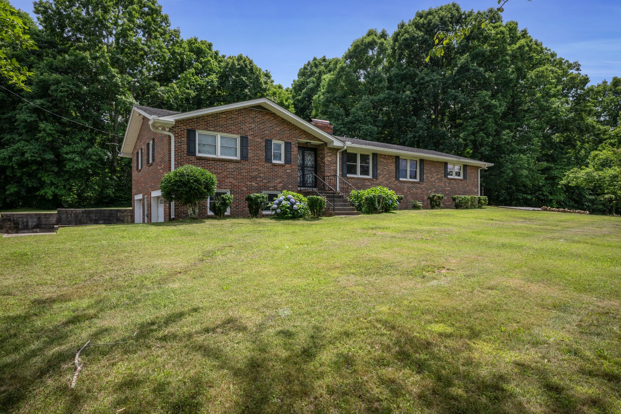 1300 2 Mile Road Burns, TN 37029 - Photo 2 of 38 a view of a house with a yard