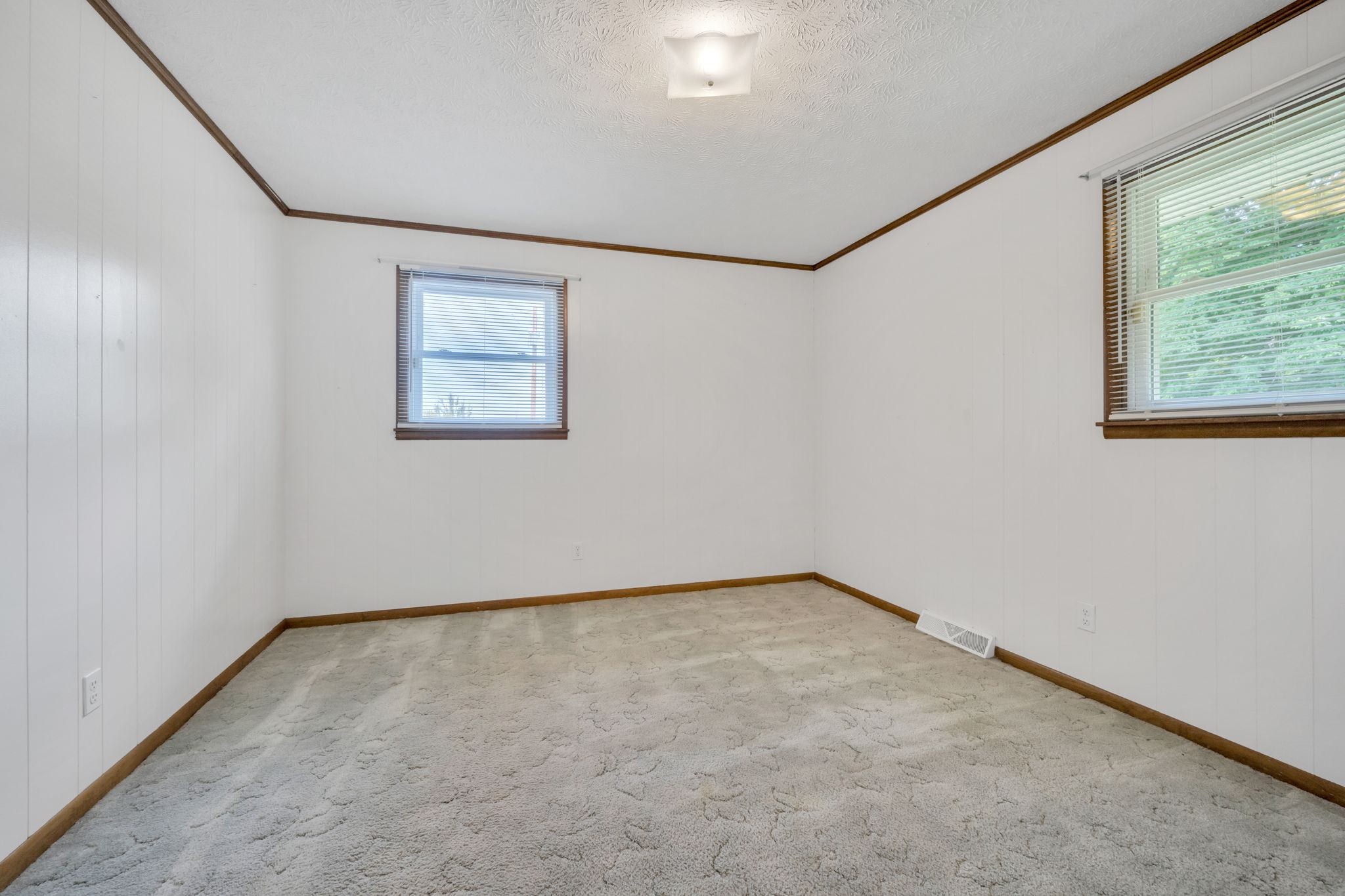 1300 2 Mile Road Burns, TN 37029 - Photo 26 of 38 an empty room with a window