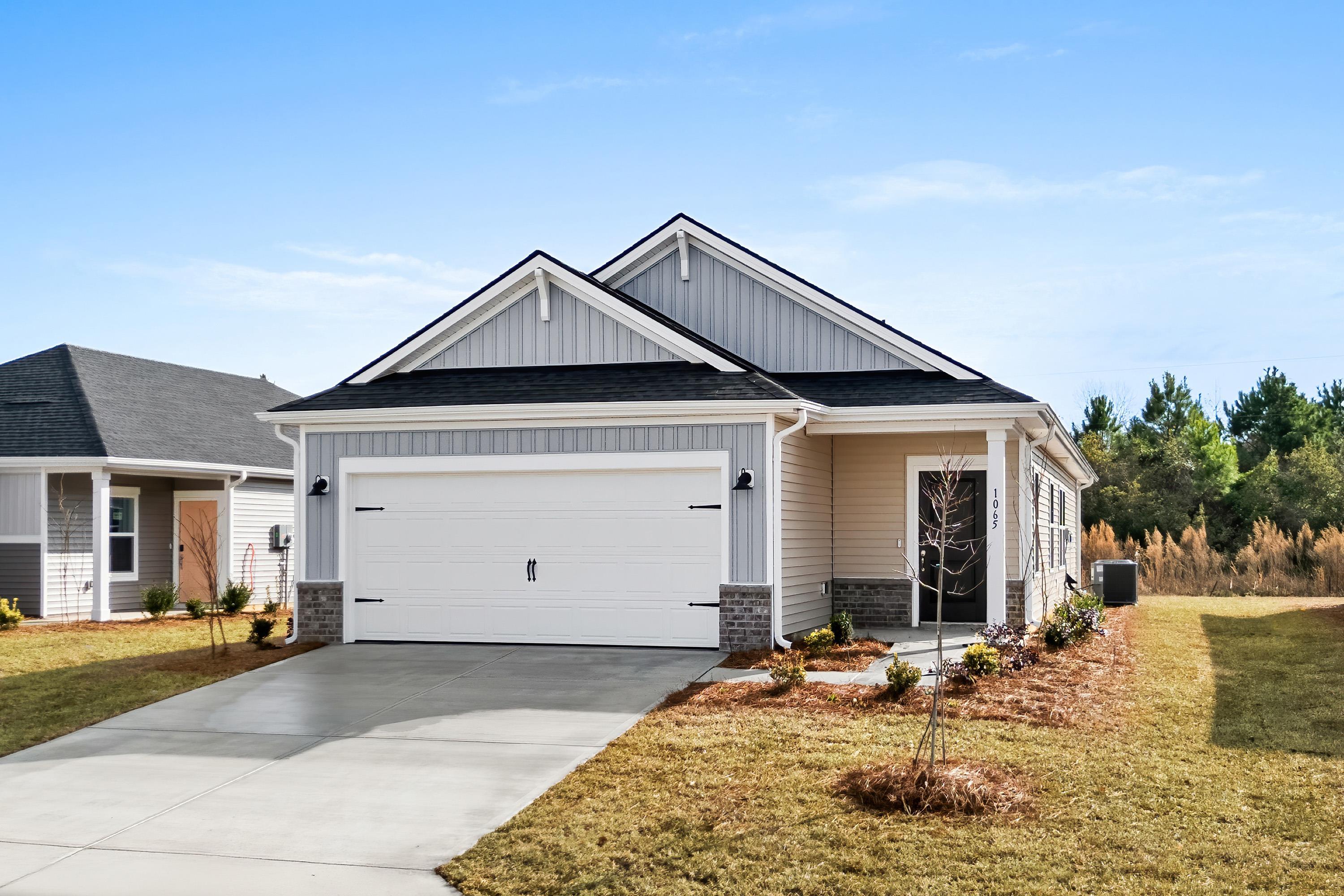 1028 Lauryn Oak Loop Longs, SC 29568 - Photo 1 of 13 Photo is not of the actual home, but is an example photo of a completed home and may depict options and/or features that are not included