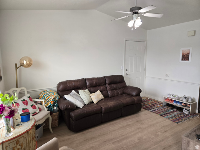 343 300 North, Unit 9 Provo, UT 84601 - Photo 3 of 10 Living room featuring vaulted ceiling, wood finished floors, and ceiling fan