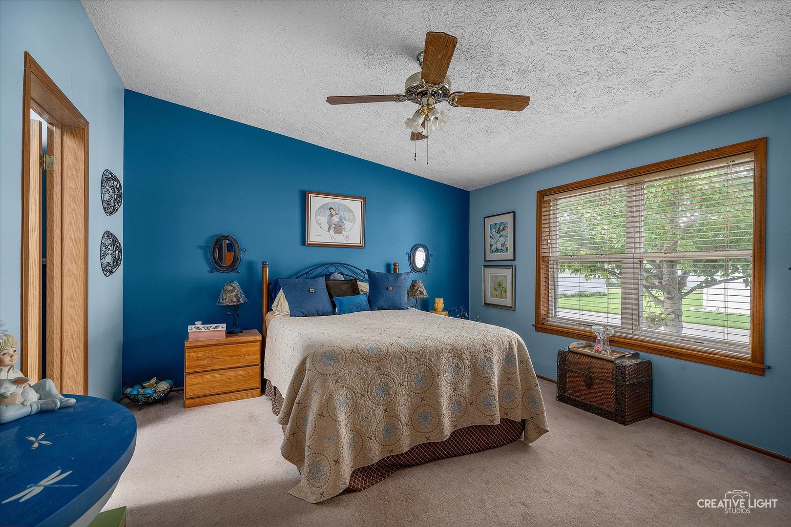 132 Cardinal Lane Sandwich, IL 60548 - Photo 12 of 17 a bedroom with a bed and a large window