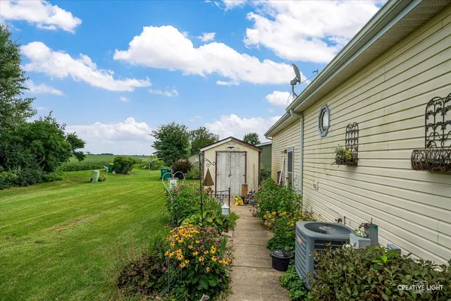 a view of a back yard of the house
