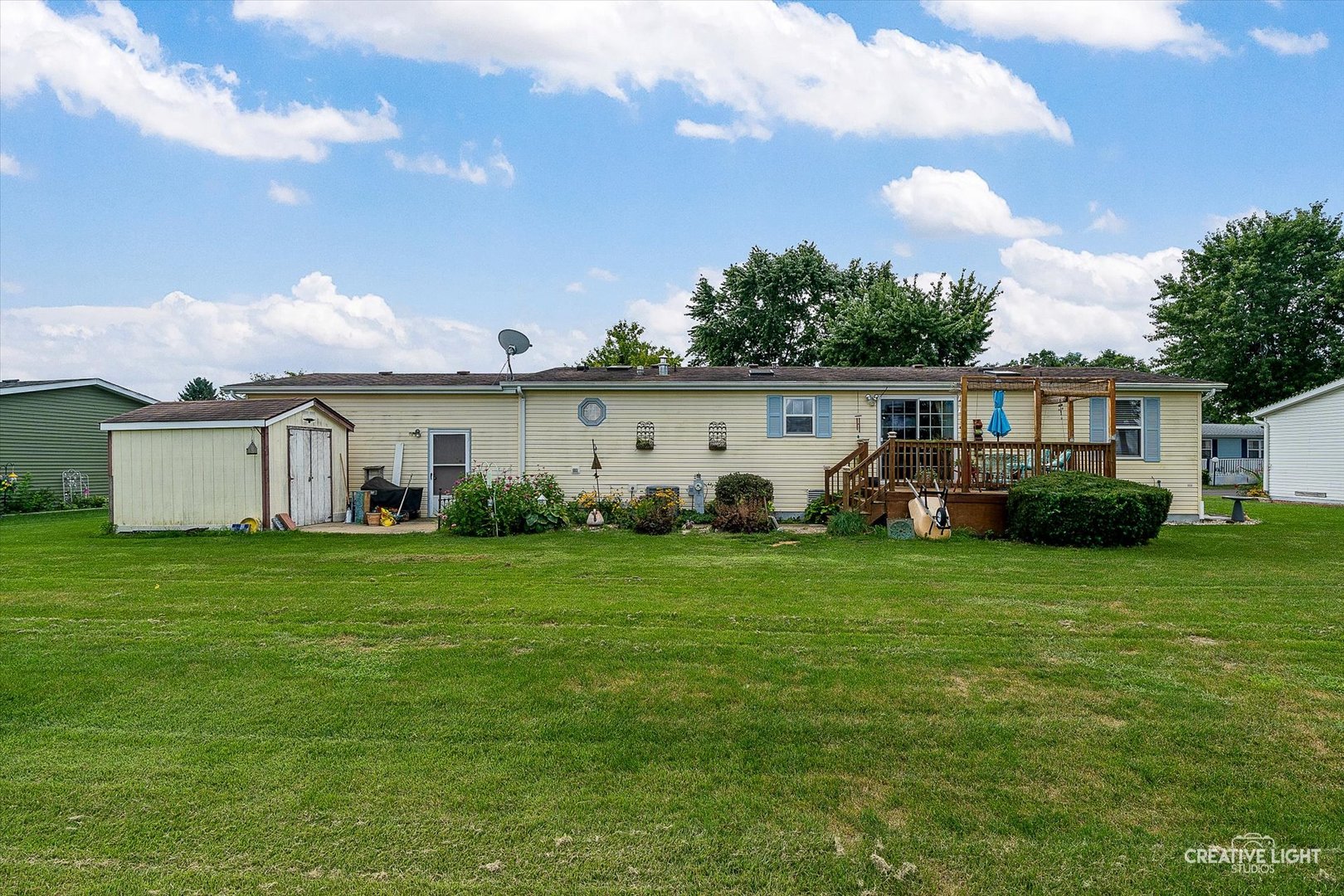 132 Cardinal Lane Sandwich, IL 60548 - Photo 16 of 17 a front view of a house with garden