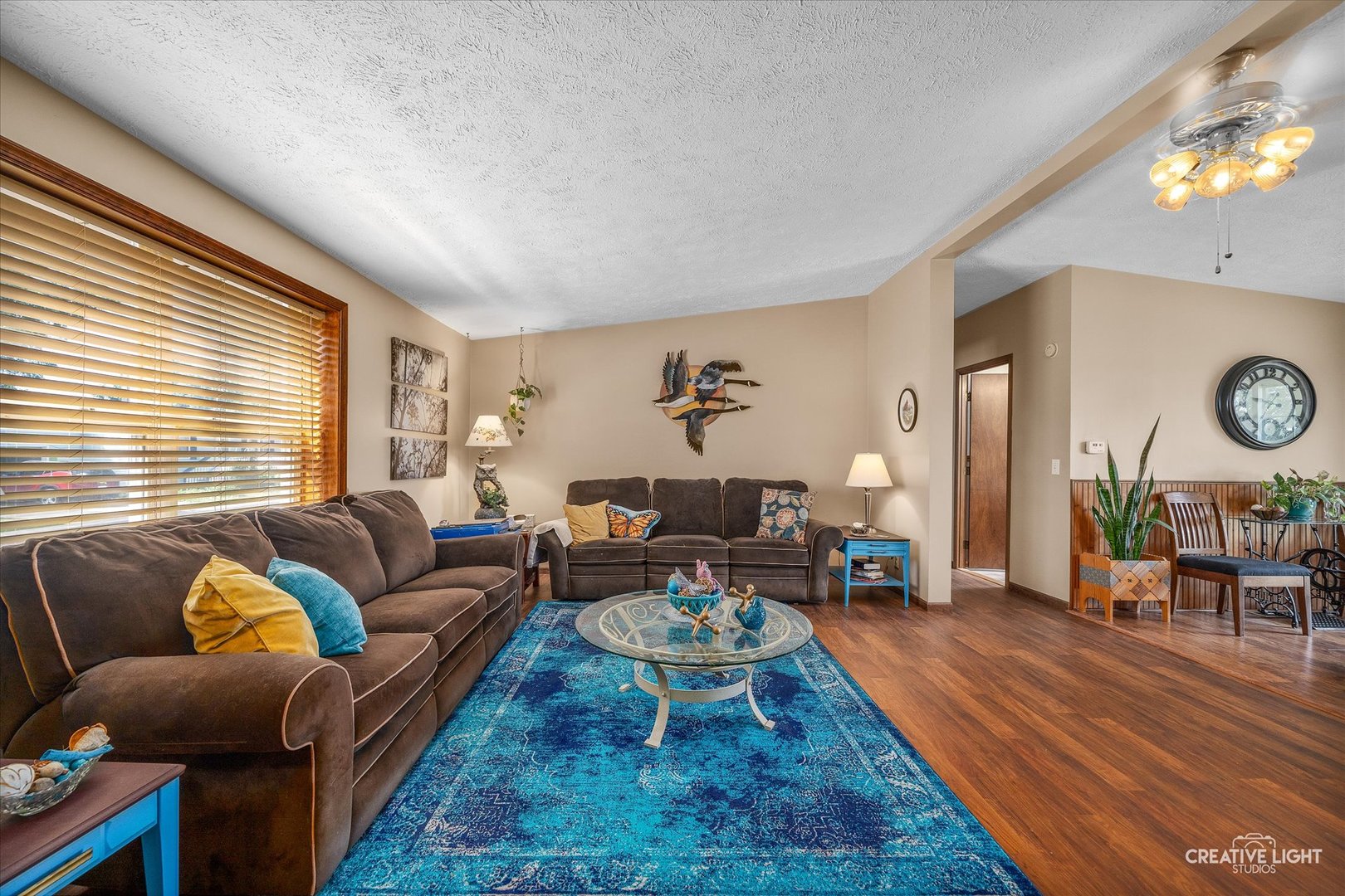 132 Cardinal Lane Sandwich, IL 60548 - Photo 3 of 17 a living room with furniture couches and a large window