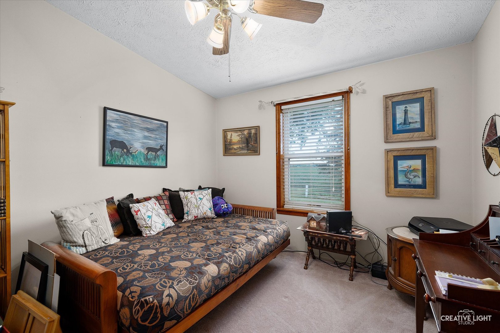 132 Cardinal Lane Sandwich, IL 60548 - Photo 4 of 17 a bedroom with a bed and a couch