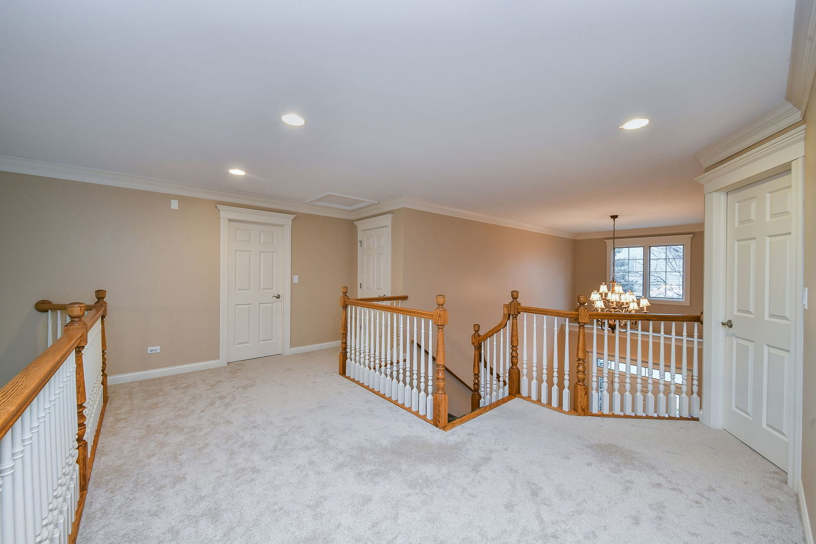 1811 Rizzi Lane, Unit 1811 Bartlett, IL 60103 - Photo 16 of 29 a view of an empty room with windows