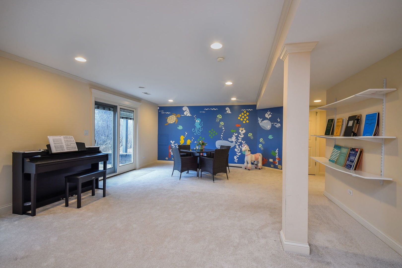 1811 Rizzi Lane, Unit 1811 Bartlett, IL 60103 - Photo 22 of 29 a view of livingroom with furniture and a chandelier