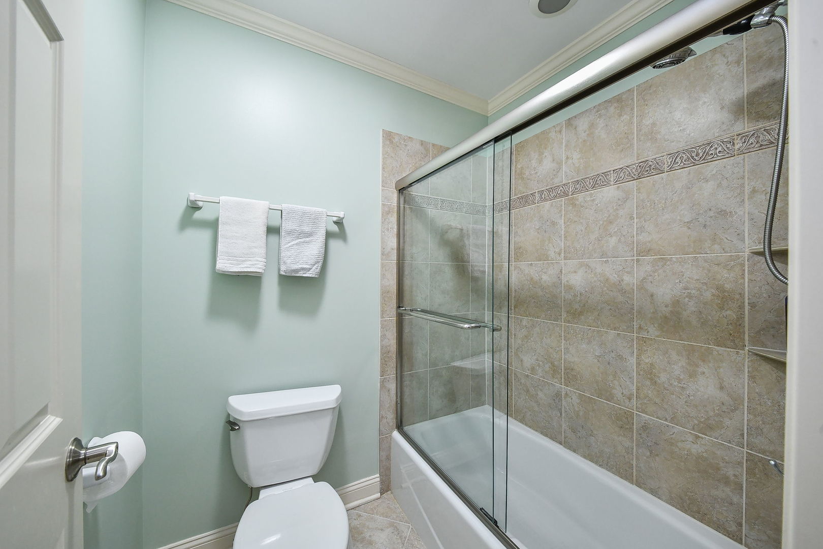 1811 Rizzi Lane, Unit 1811 Bartlett, IL 60103 - Photo 24 of 29 a bathroom with a toilet and a shower
