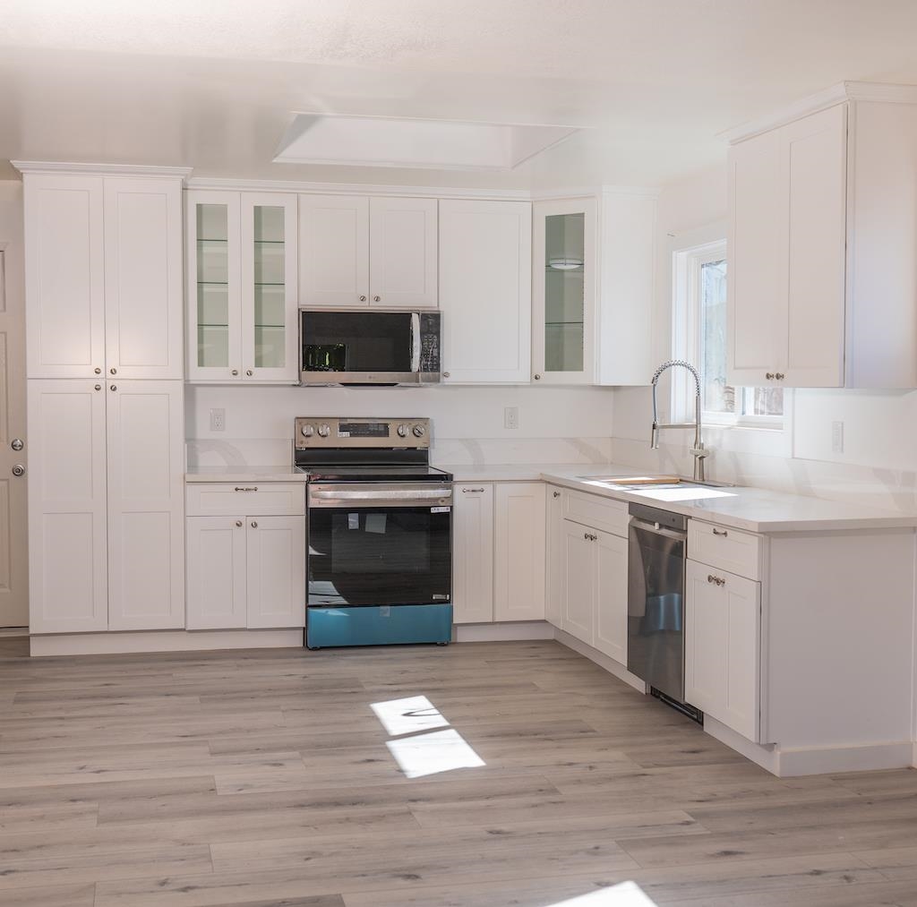 2275 Dover Avenue Fairfield, CA 94533 - Photo 3 of 9 a kitchen with a sink stove and microwave