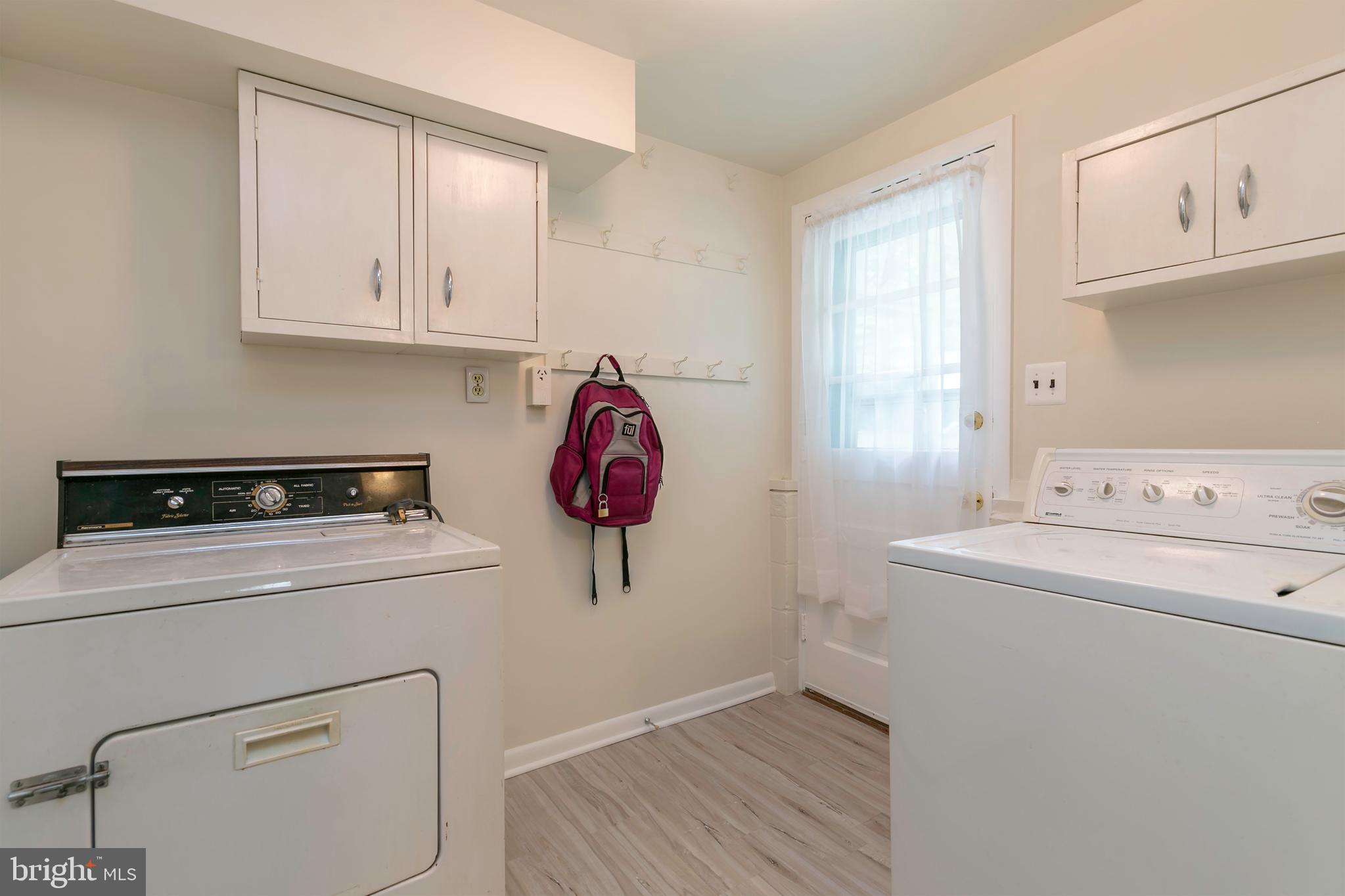 1307 N Road Severna Park, MD 21146 - Photo 15 of 32 Laundry room and door to three season porch