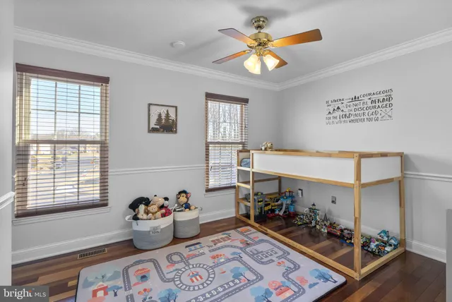 a bed room with a bed and a window