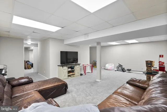 a room with furniture and window