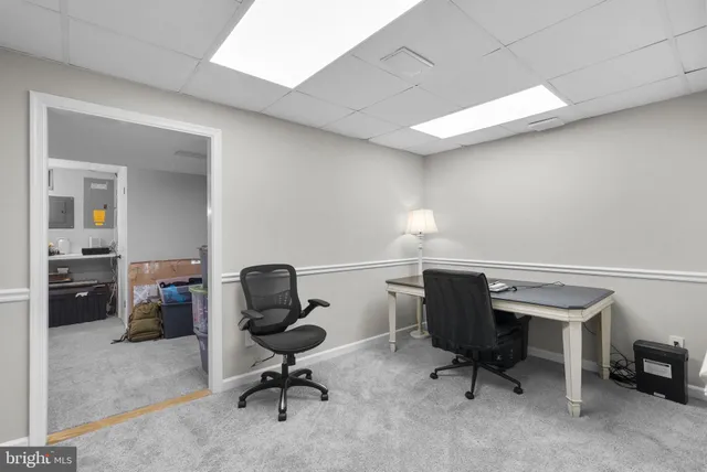 a view of a chairs and table on the deck