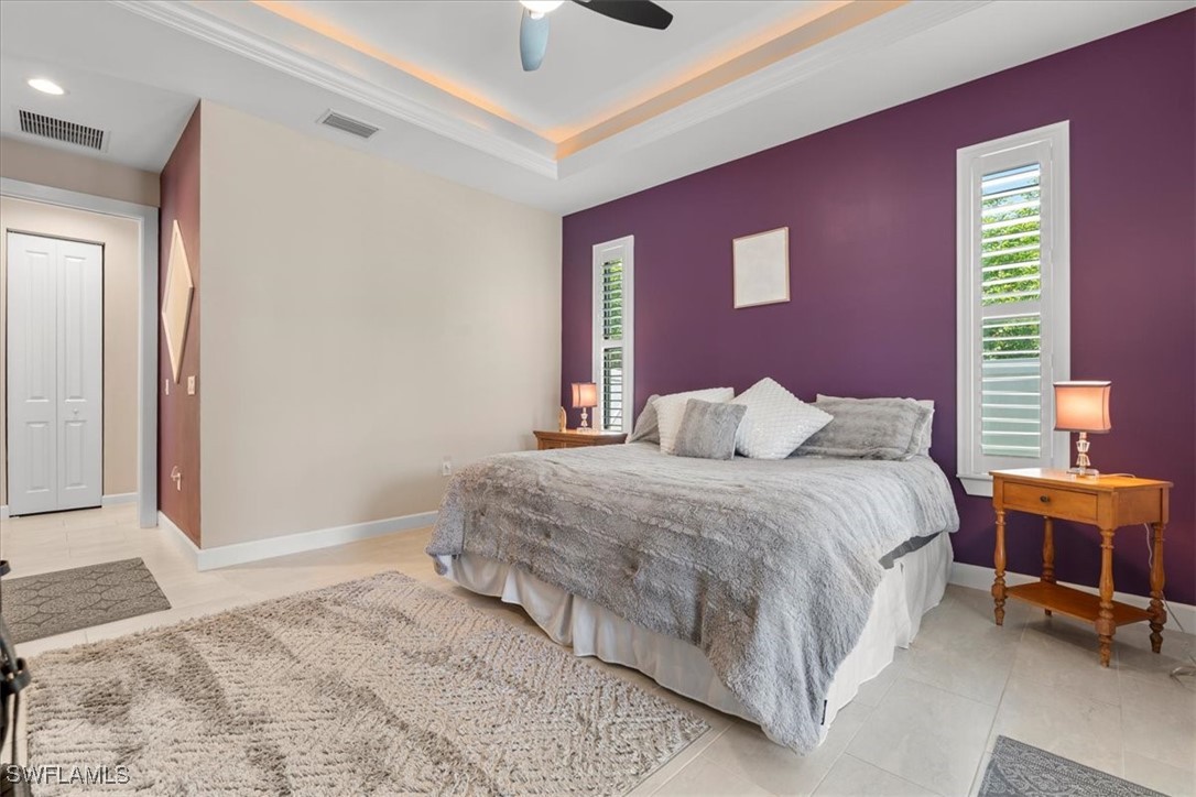 8081 Dimstead Street Port Charlotte, FL 33981 - Photo 23 of 42 a bedroom with a bed and a window