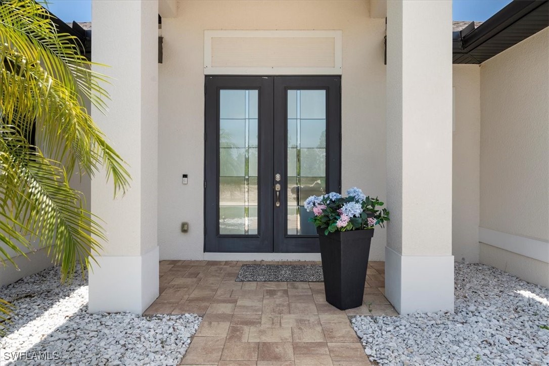 8081 Dimstead Street Port Charlotte, FL 33981 - Photo 3 of 42 a view of a entryway door front of house