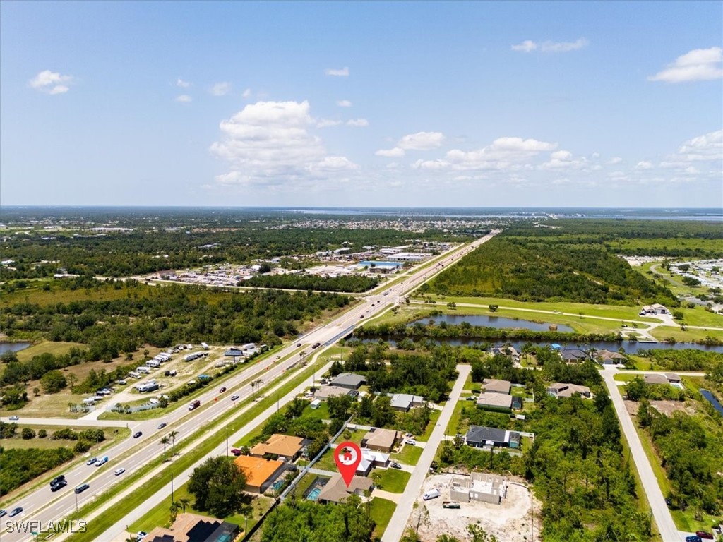 8081 Dimstead Street Port Charlotte, FL 33981 - Photo 42 of 42 an aerial view of residential houses with outdoor space