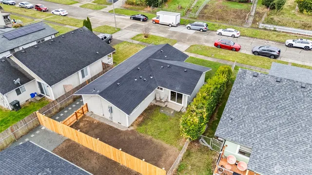 an aerial view of a house with a garden