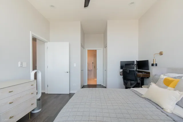 a bedroom with a bed and furniture