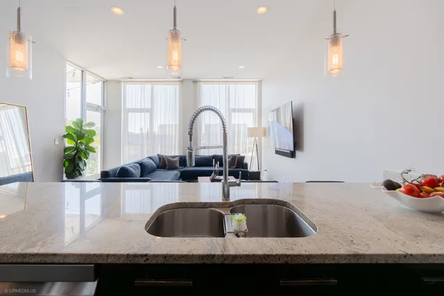 a kitchen with a sink and a cabinets
