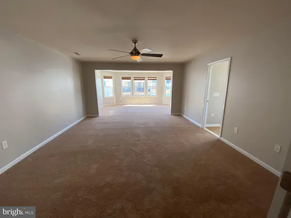 a view of empty room with a window