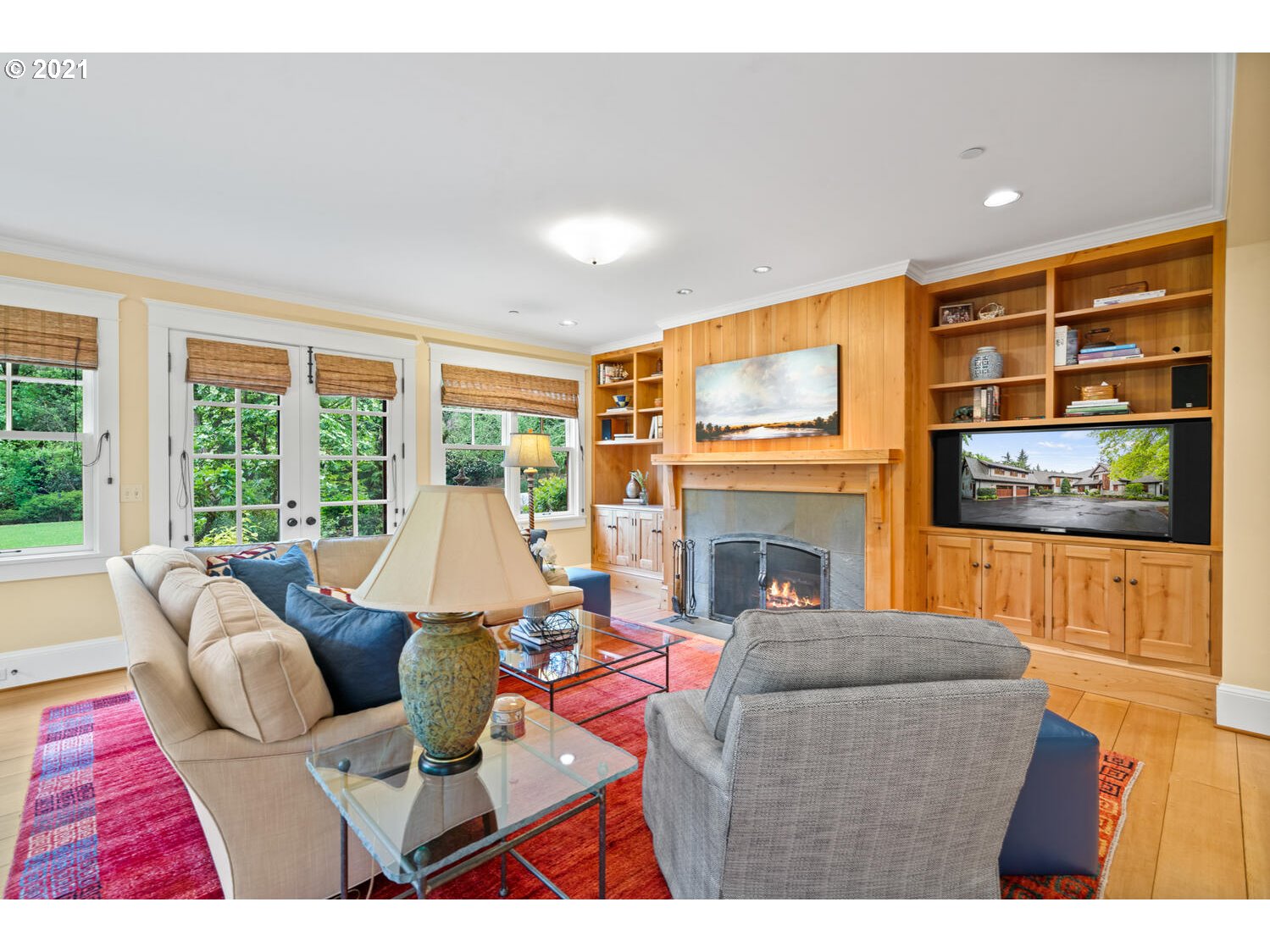 1925 South Military Road Portland, OR 97219 - Photo 13 of 32 a living room with furniture a rug and a floor to ceiling window