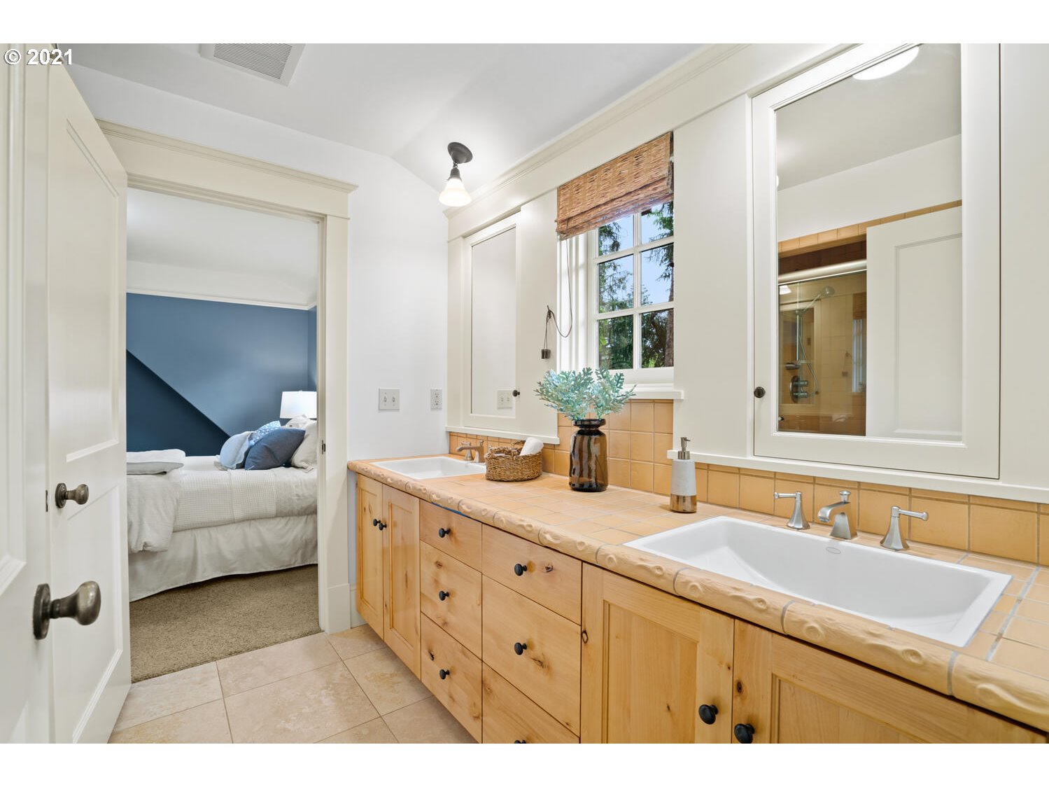 1925 South Military Road Portland, OR 97219 - Photo 20 of 32 a bathroom with a sink double vanity