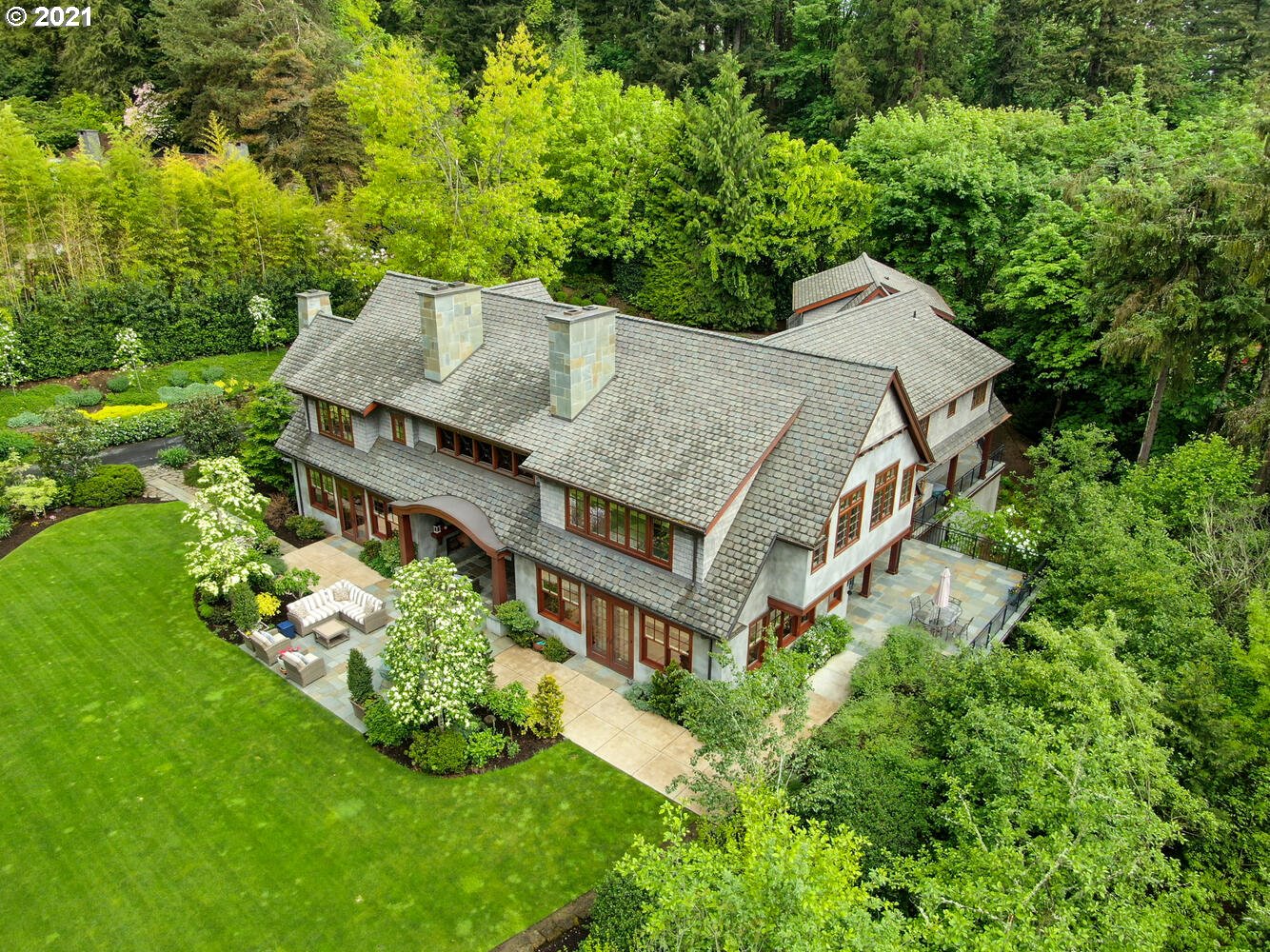 1925 South Military Road Portland, OR 97219 - Photo 3 of 32 an aerial view of a house with a yard