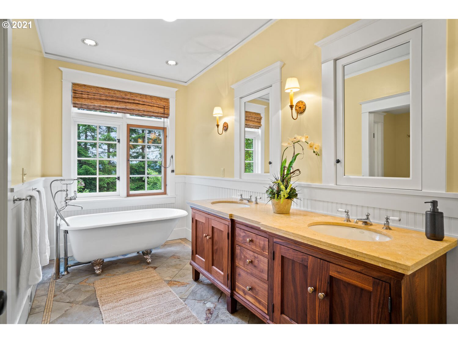 1925 South Military Road Portland, OR 97219 - Photo 23 of 32 a bathroom with a sink double vanity and a bathtub