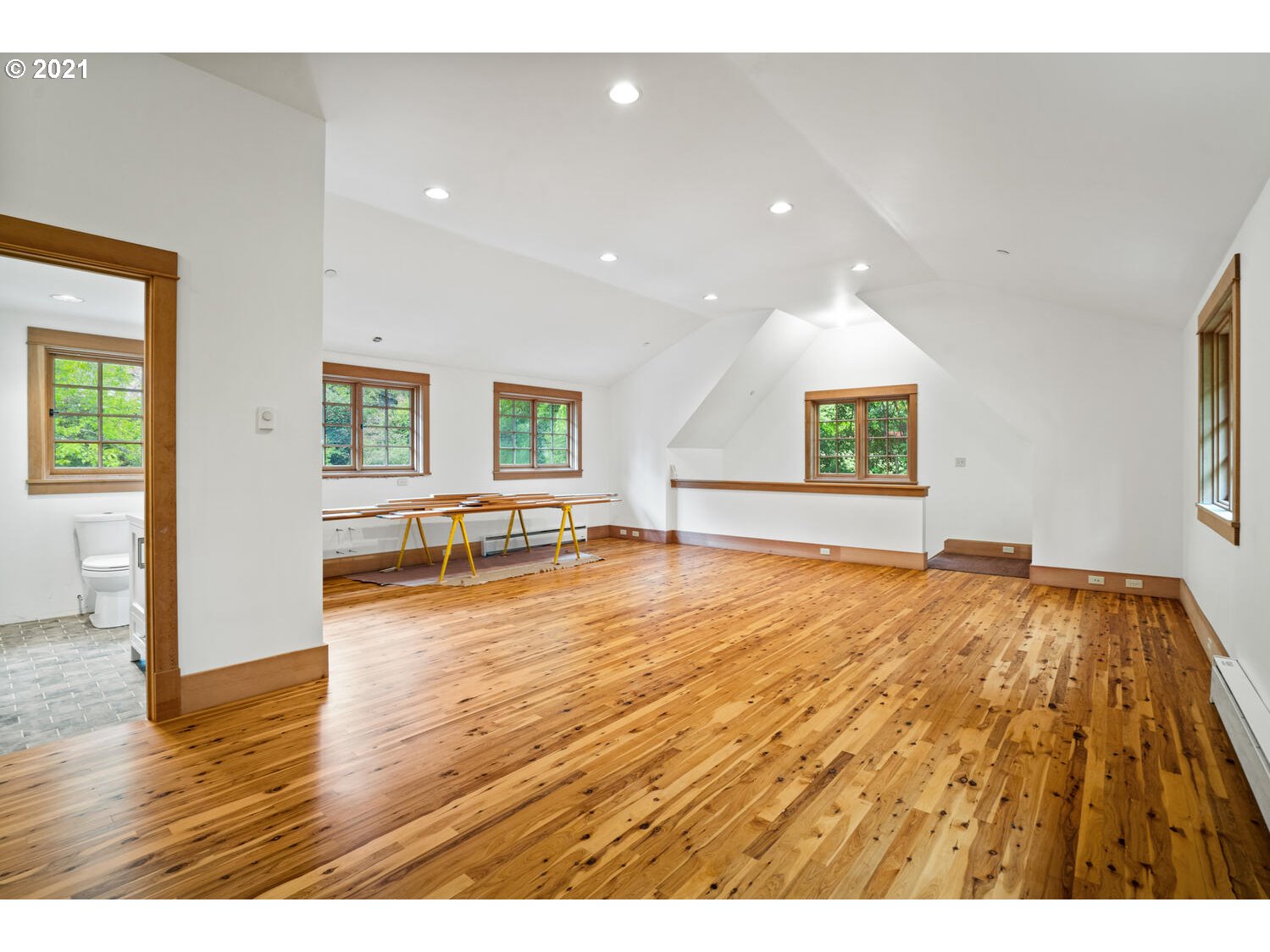 1925 South Military Road Portland, OR 97219 - Photo 28 of 32 a view of an empty room with window and wooden floor