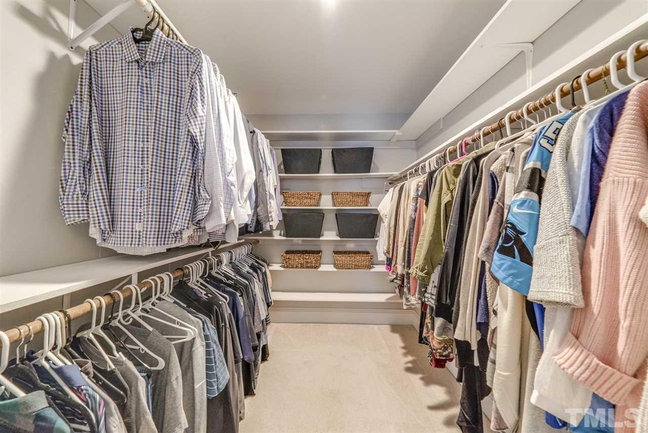3105 Chancery Place Raleigh, NC 27607 - Photo 14 of 25 a view of walk in closet with clothes and shoes